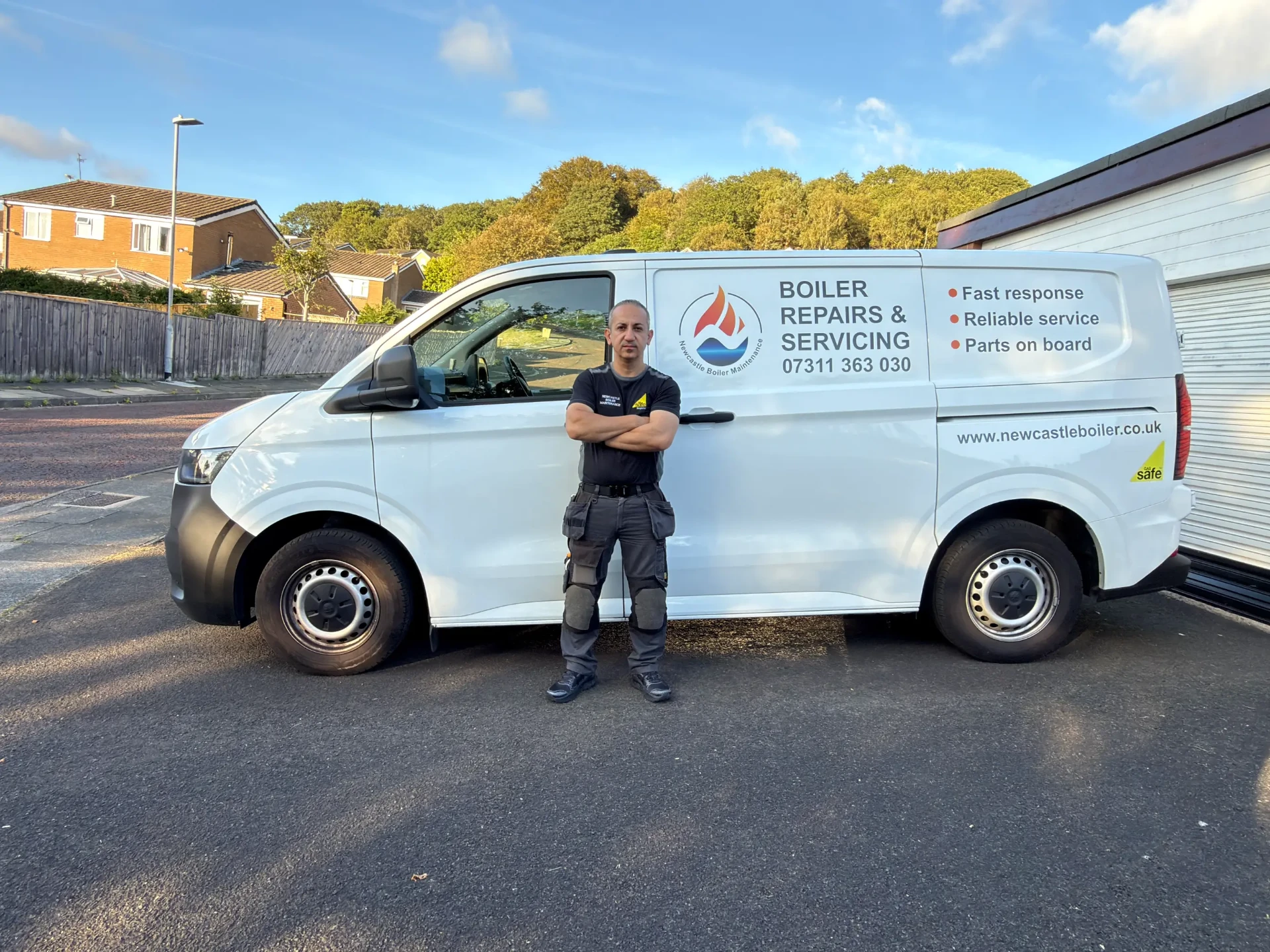 Newcastle Boiler Maintenance engineer standing beside the branded boiler repairs and servicing van in Newcastle upon Tyne